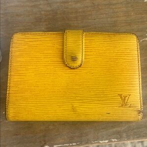 Louis Vuitton Epi Porte Monnaie Billets Viennois wallet in yellow epi leather.